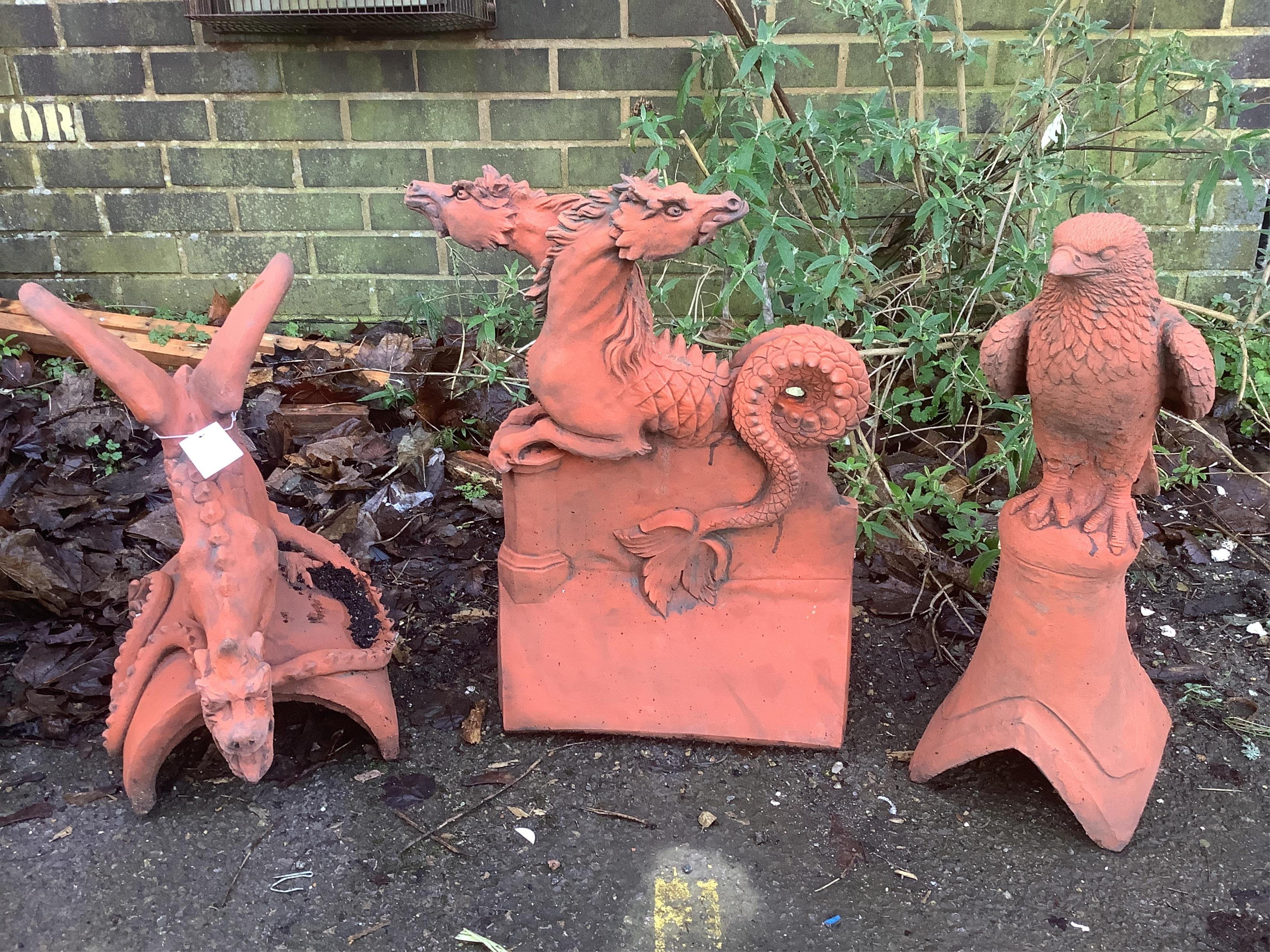 Three terracotta ridge tiles. Condition - largest height 52cm. Condition - fair to good